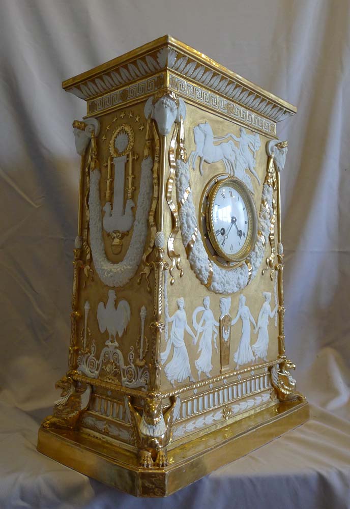 Antique Neo-classical gilded and natural bisque mantel clock.