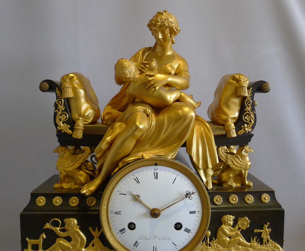 Antique French Empire clock by Adam L'Echopie the younger of mother nursing her baby.