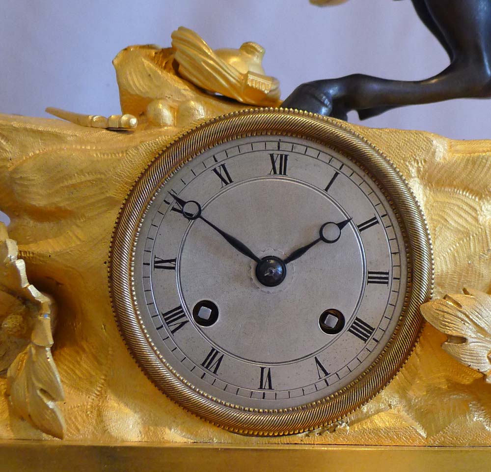 Antique French Greek Revolution or Hellenistic mantel clock of Turk on horseback.