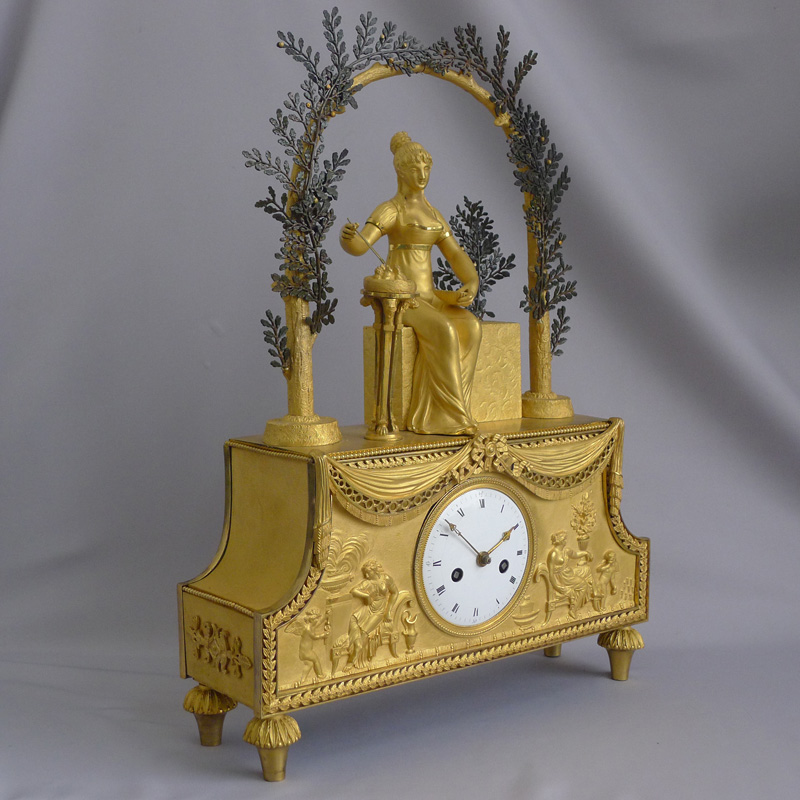 Rare French Directoire ormolu mantel clock of Josephine sitting in a bower