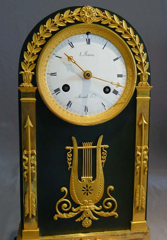 French Empire antique clock, ormolu, patinated bronze and marble signed by both Ravrio and Mesnil.