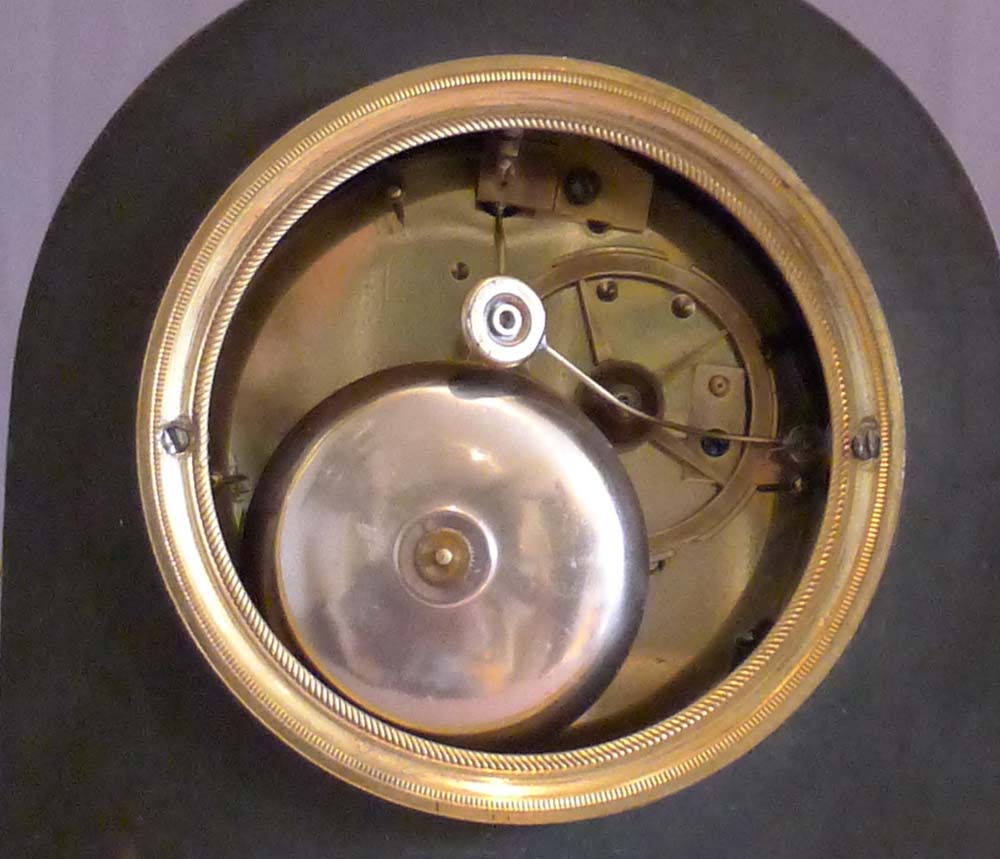 French Empire antique clock, ormolu, patinated bronze and marble signed by both Ravrio and Mesnil.