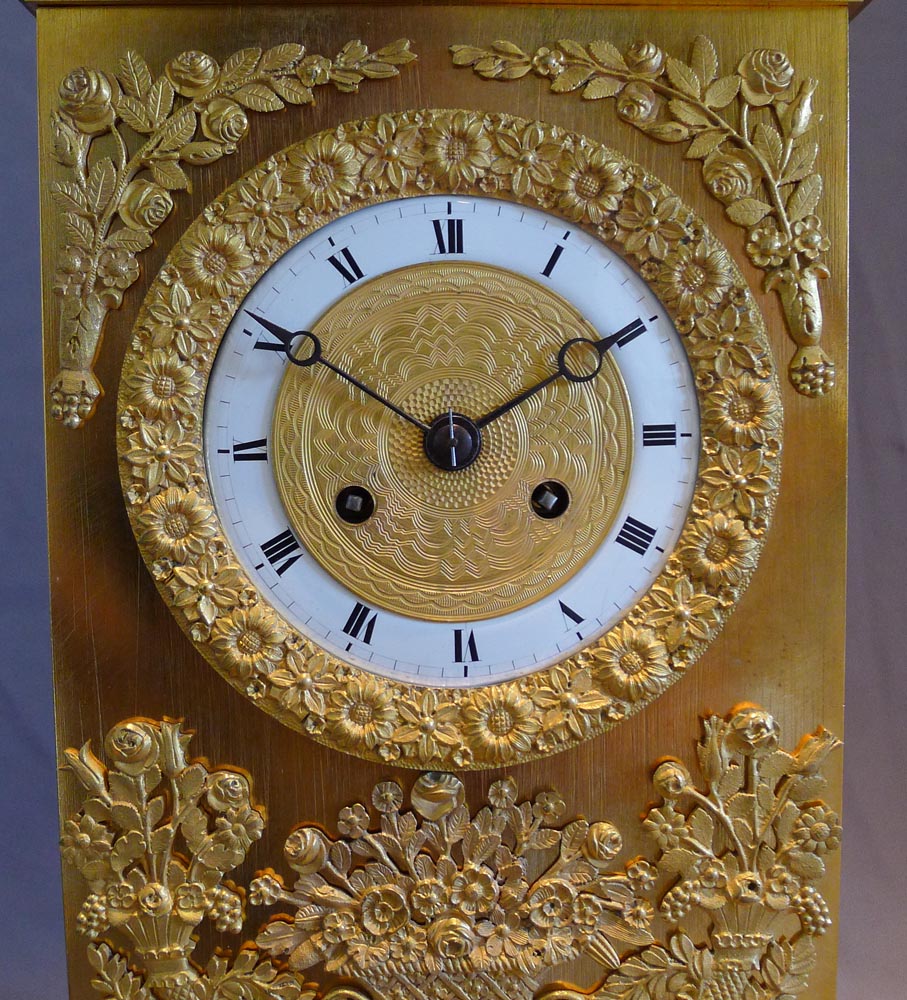 Antique French Charles X ormolu mantel clock depicting Love.