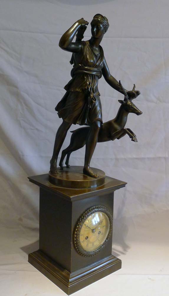 Antique French Charles X period patinated bronze mantel clock with bronze of Diana.