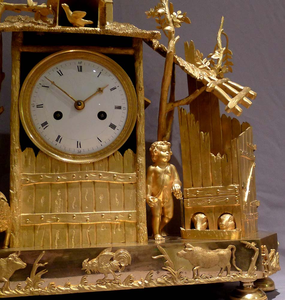 Antique French Empire ormolu mantel clock of the Arcadian Genre.