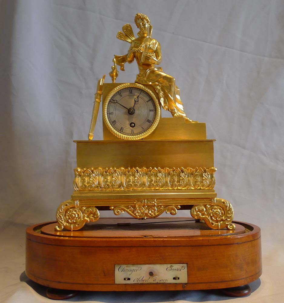Antique Charles X  miniature ormolu clock of Pandora on musical base by Alibert.