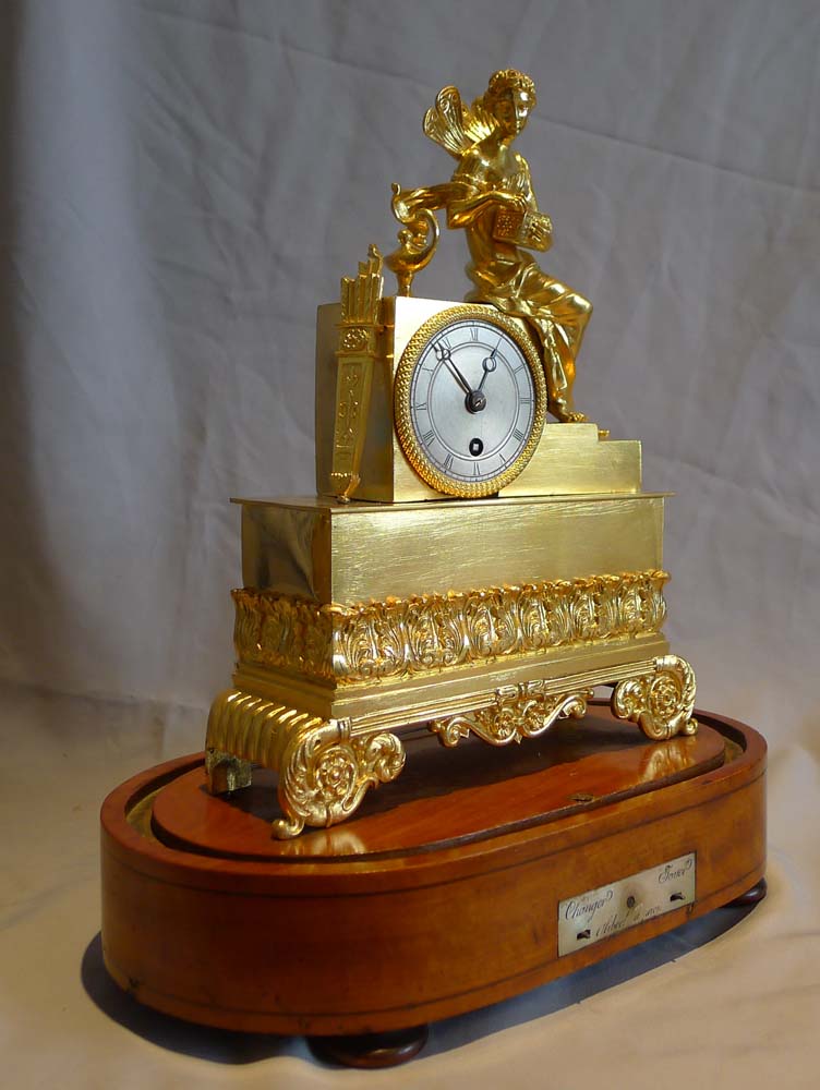Antique Charles X  miniature ormolu clock of Pandora on musical base by Alibert.