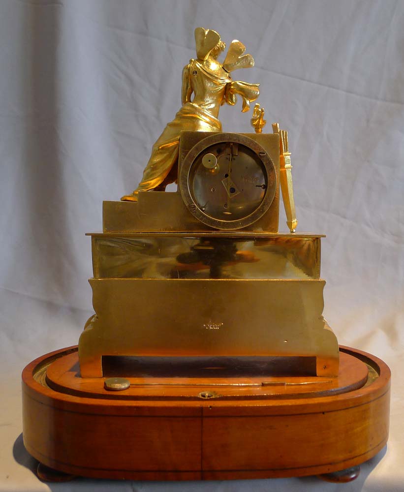 Antique Charles X  miniature ormolu clock of Pandora on musical base by Alibert.
