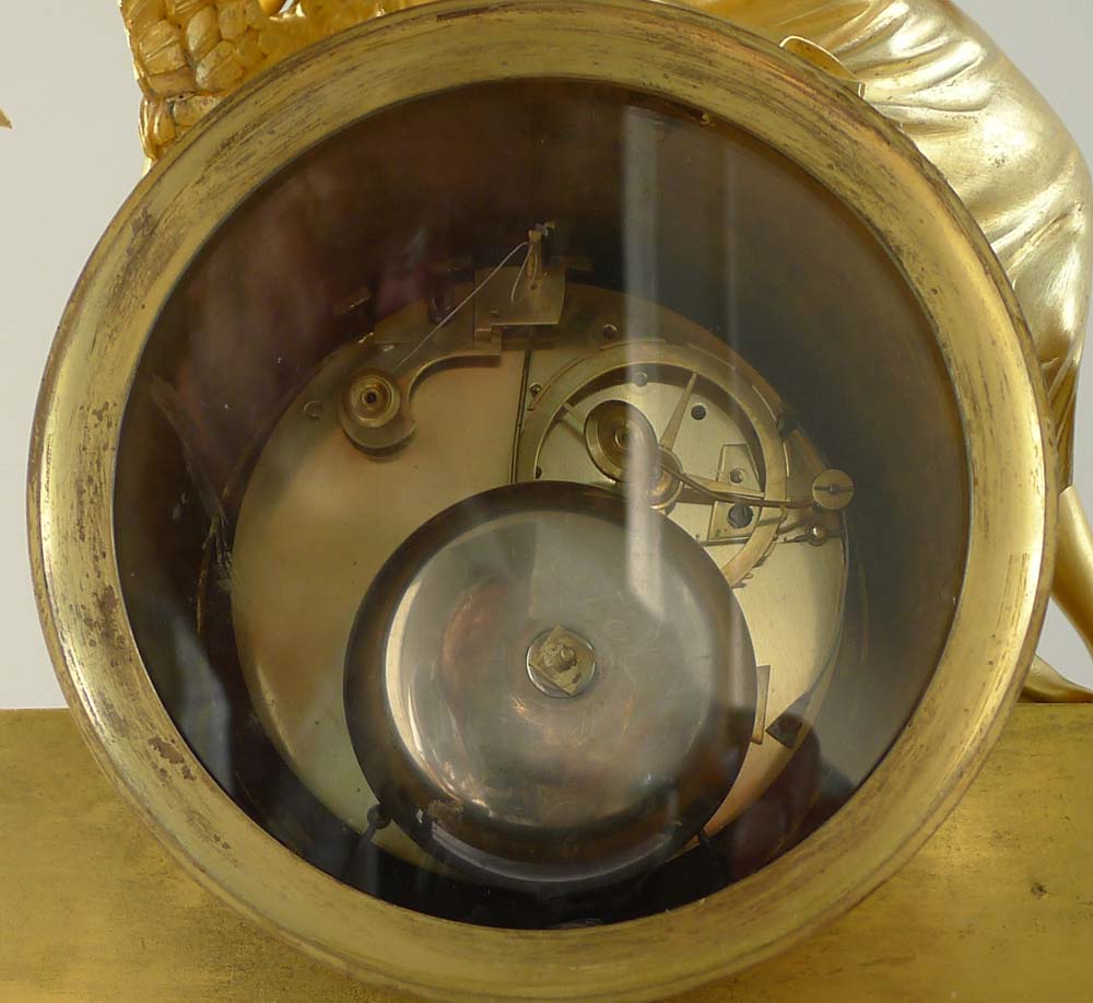 Antique French Empire ormolu clock depicting the goddess Juno or Hera.