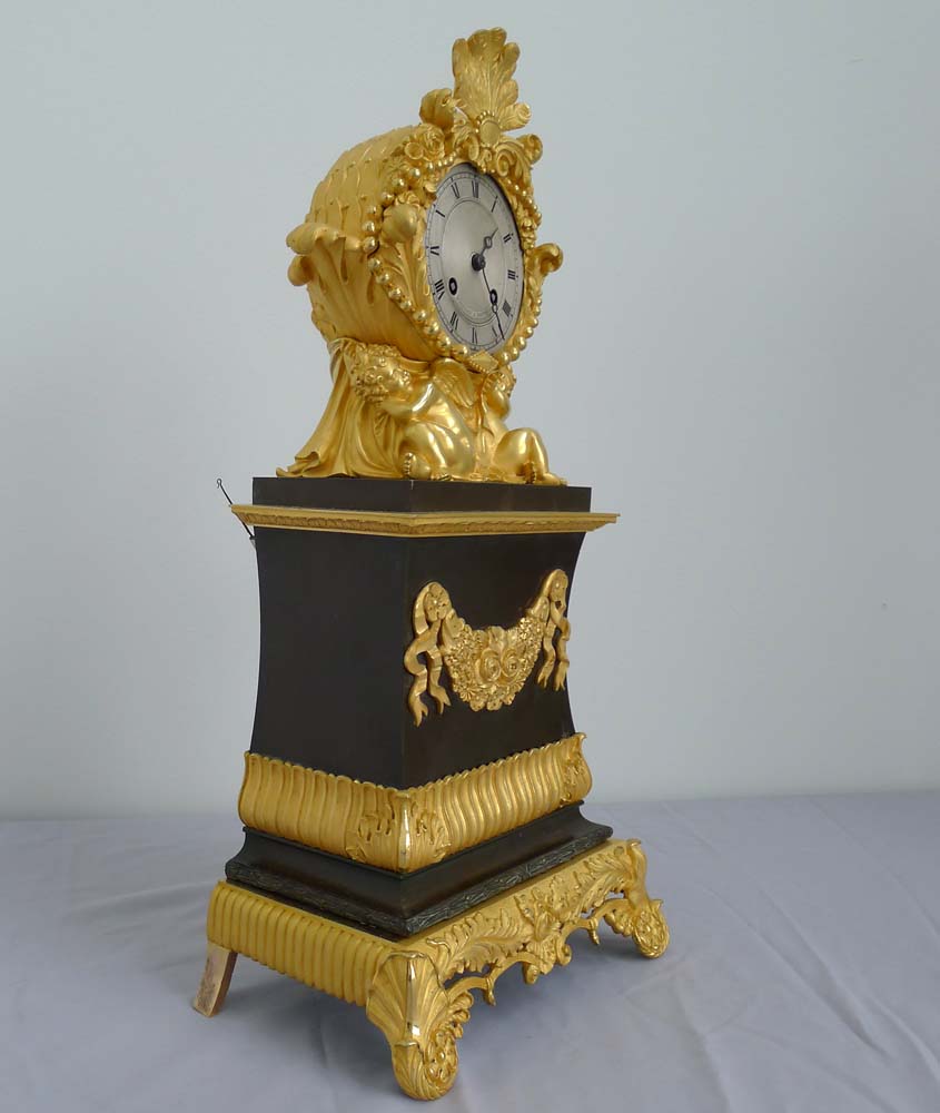 Antique Charles X patinated bronze and ormolu clock signed Pinedde a Poitiers.