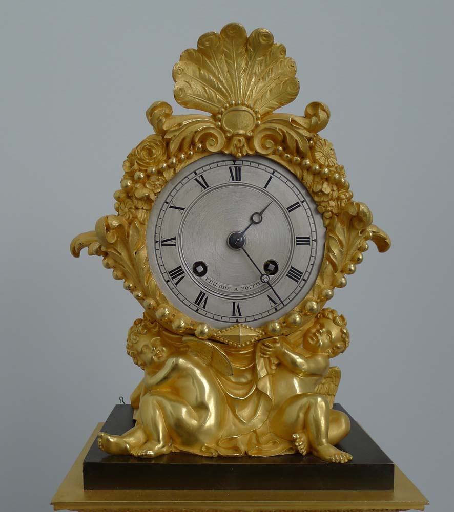 Antique Charles X patinated bronze and ormolu clock signed Pinedde a Poitiers.