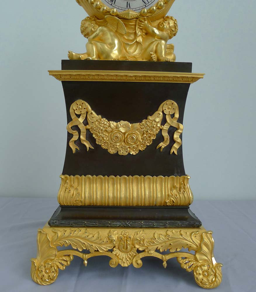 Antique Charles X patinated bronze and ormolu clock signed Pinedde a Poitiers.