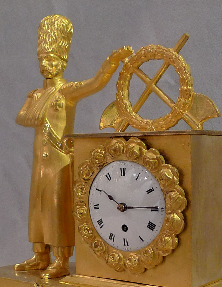 Miniature French Empire ormolu mantel clock of soldier.