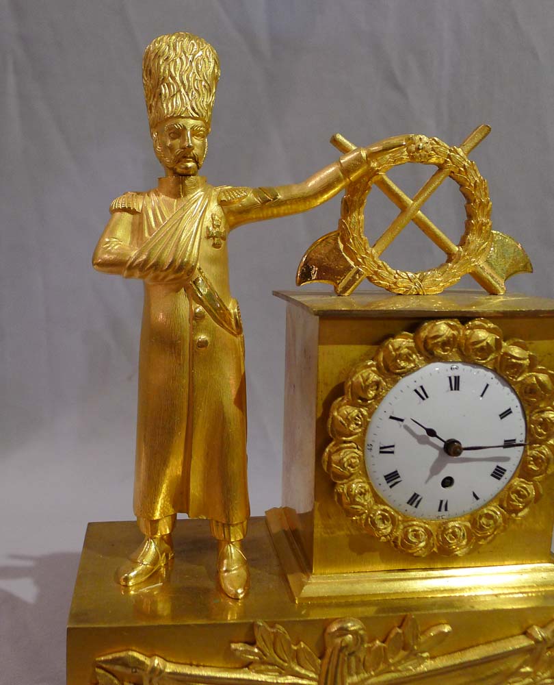 Miniature French Empire ormolu mantel clock of soldier.