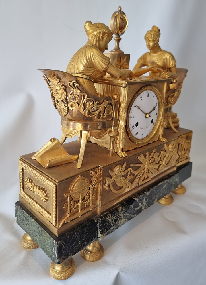 Antique French Empire mantel clock of the Astronomy Lesson by Jean-Andre Reiche