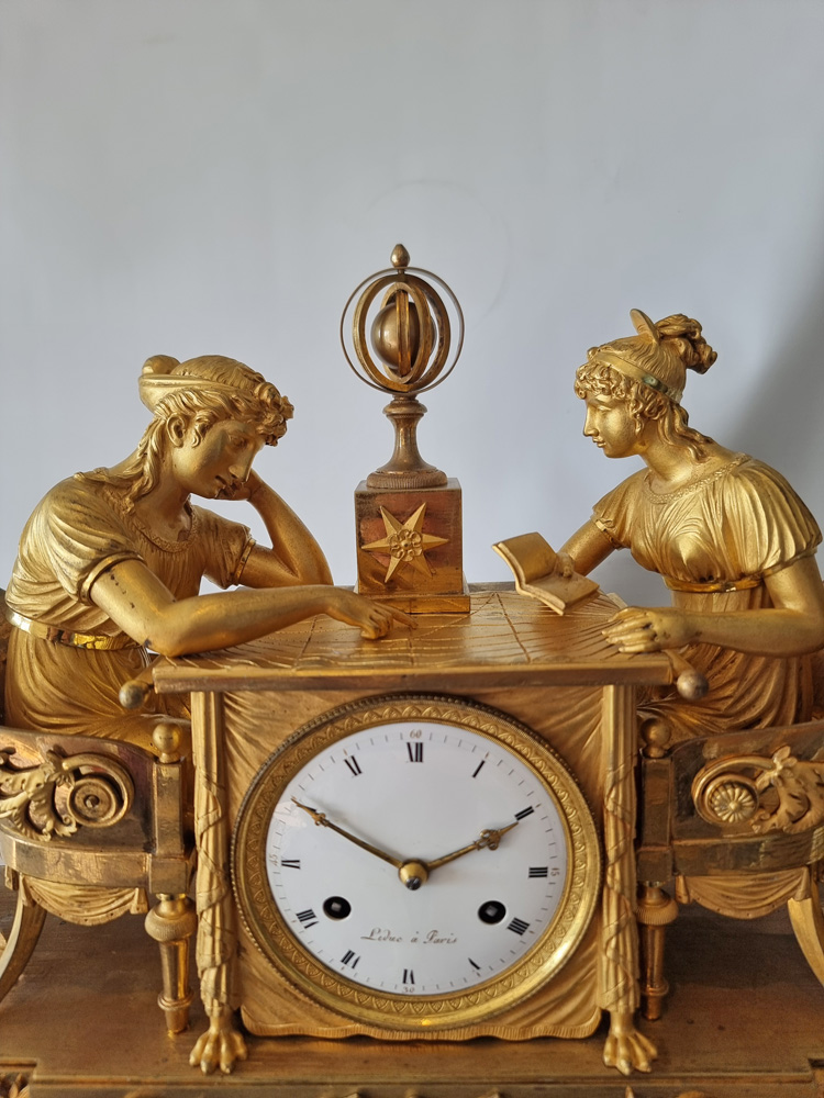 Antique French Empire mantel clock of the Astronomy Lesson by Jean-Andre Reiche