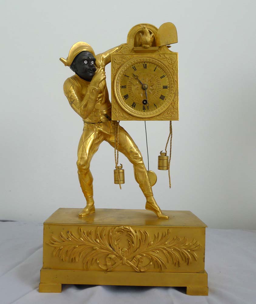 A fine Restoration or Charles X ormolu Harlequin clock.
