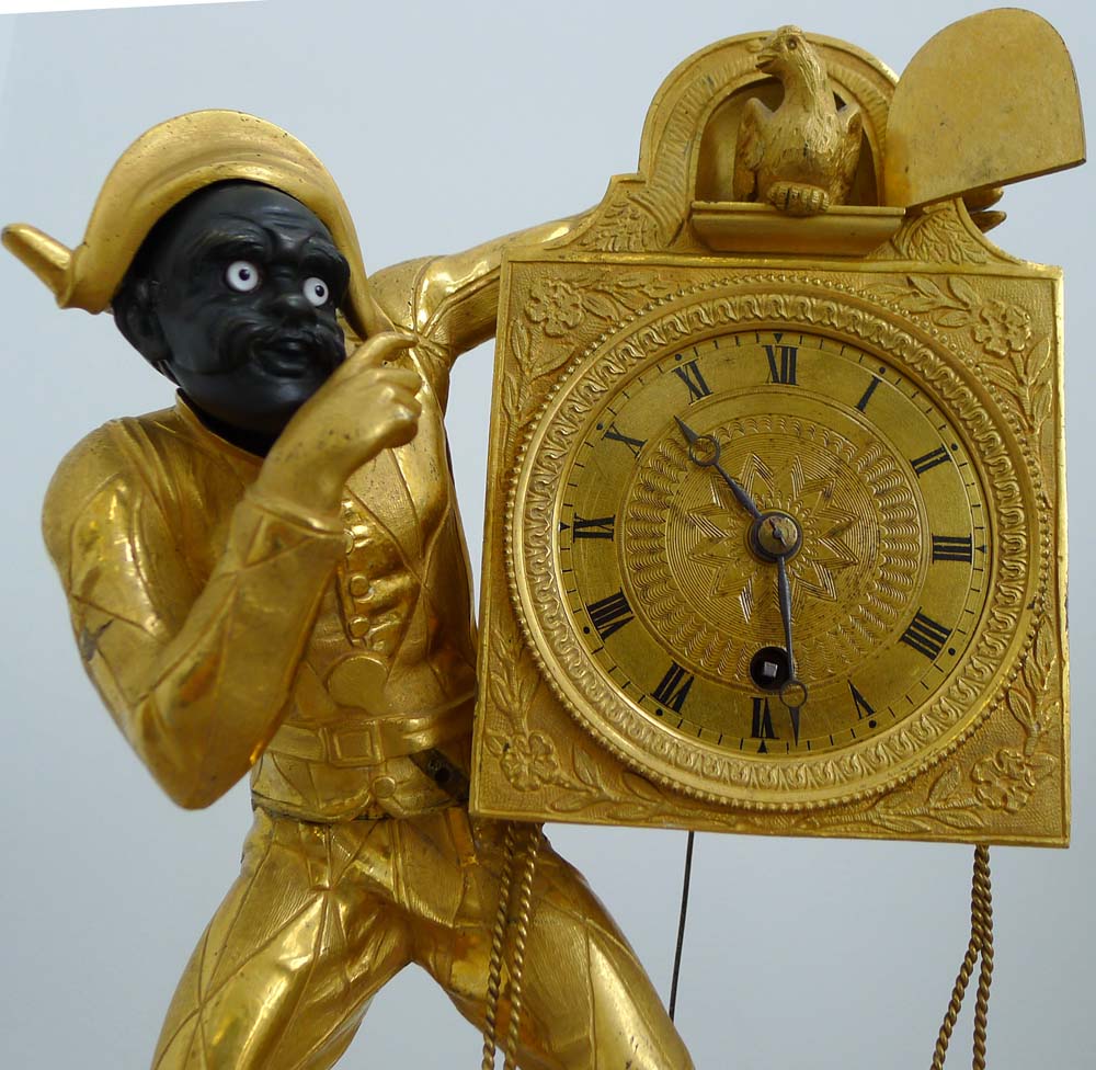 A fine Restoration or Charles X ormolu Harlequin clock.