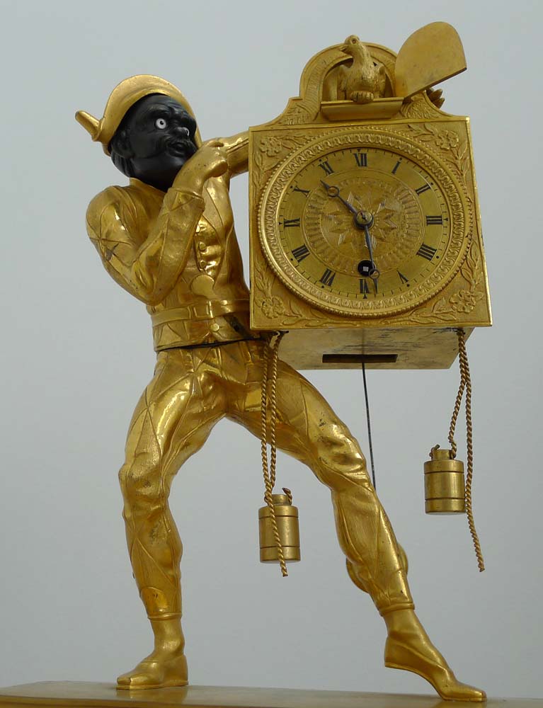 A fine Restoration or Charles X ormolu Harlequin clock.