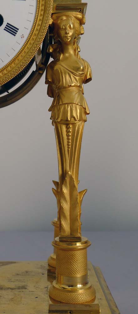Antique French Empire ormolu portico clock.
