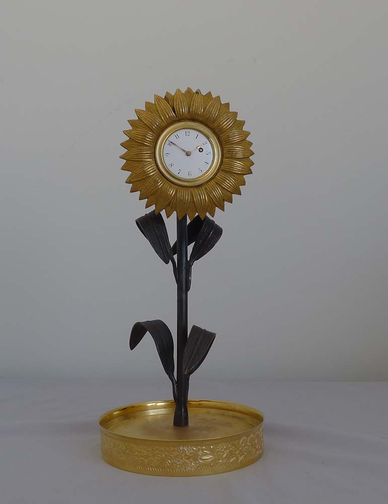 Antique English Victorian ormolu and patinated bronze sunflower clock.