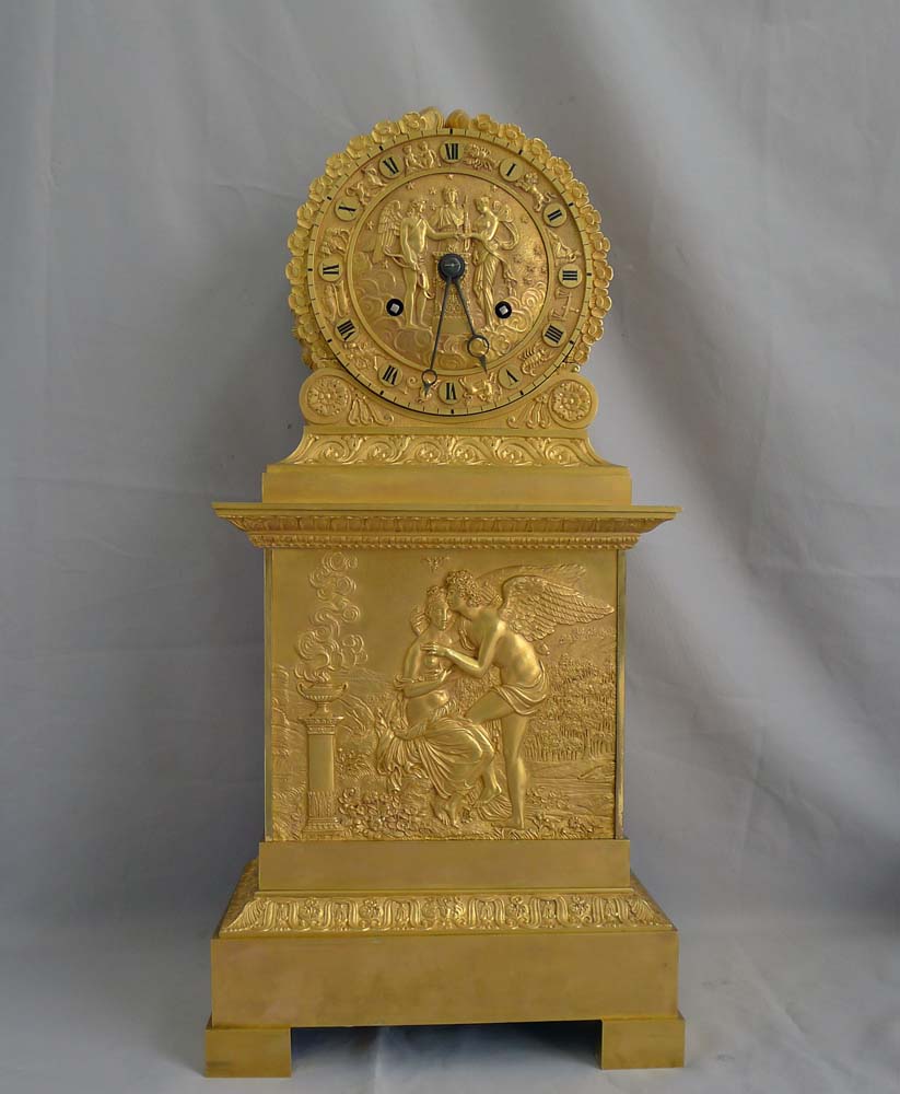 Antique French Charles X ormolu mantel clock depicting Psyche and Cupid