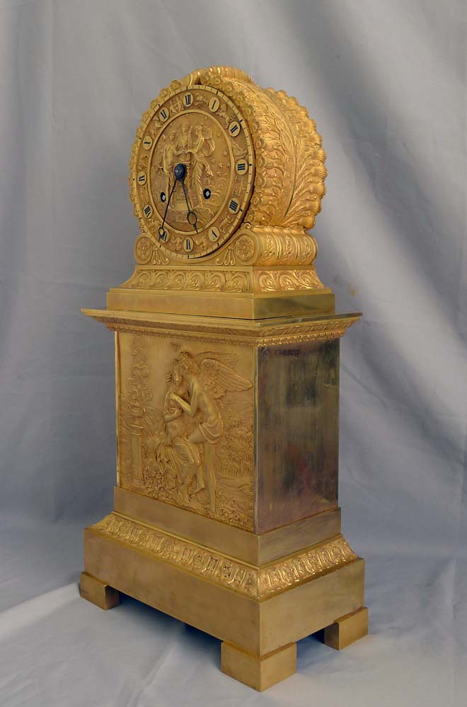 Antique French Charles X ormolu mantel clock depicting Psyche and Cupid