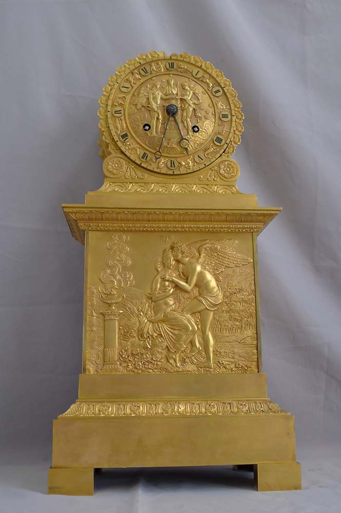 Antique French Charles X ormolu mantel clock depicting Psyche and Cupid