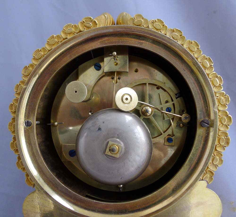 Antique French Charles X ormolu mantel clock depicting Psyche and Cupid