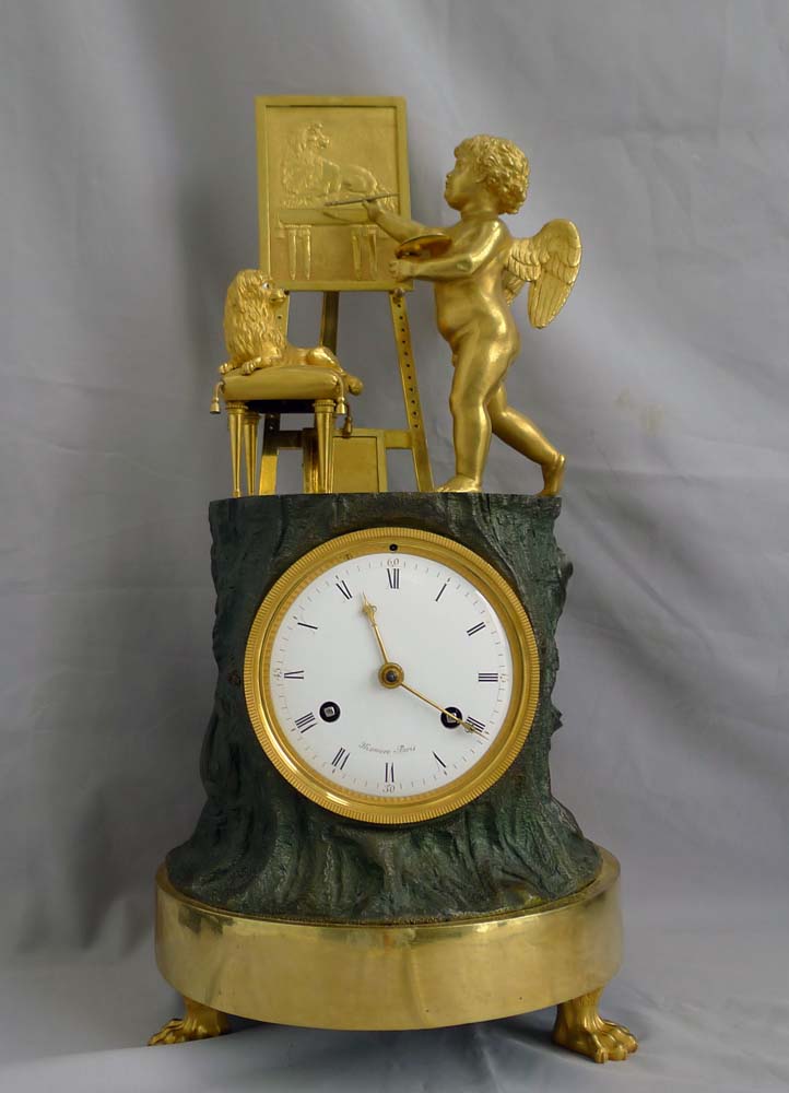 Fine French Empire Genre clock of Cupid as Artist by Maniere.