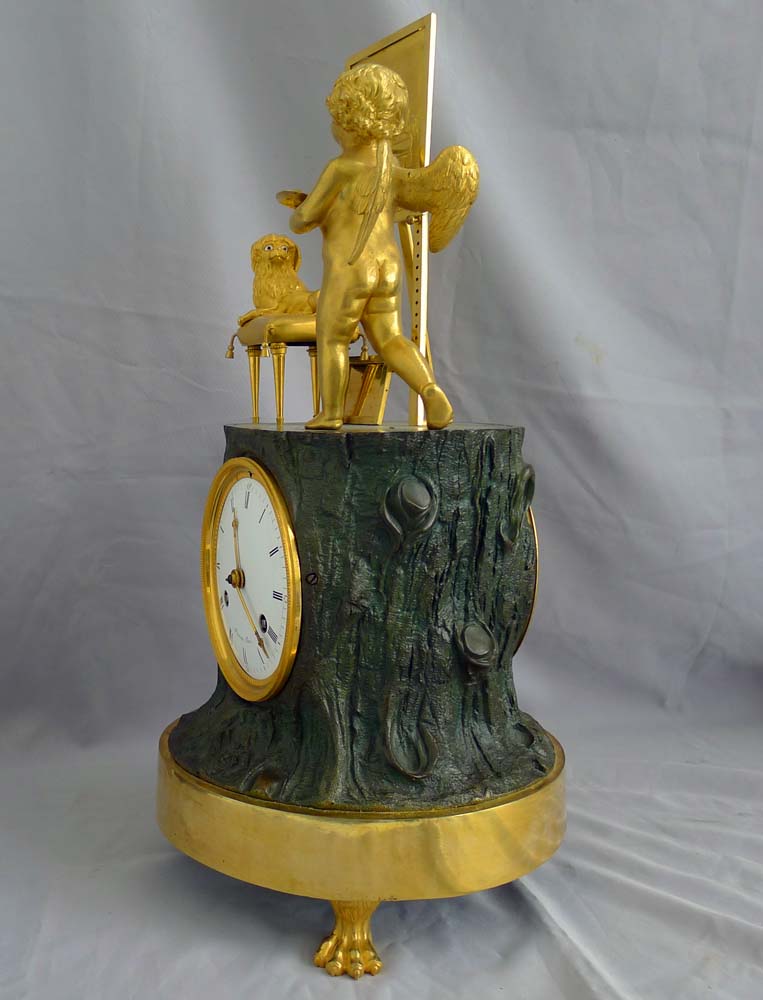 Fine French Empire Genre clock of Cupid as Artist by Maniere.