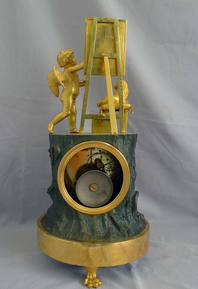 Fine French Empire Genre clock of Cupid as Artist by Maniere.