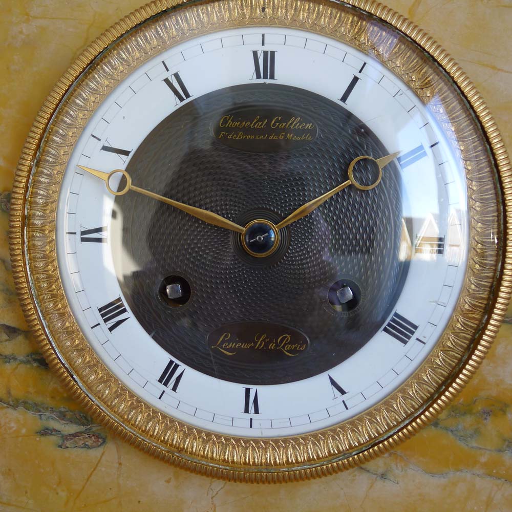 Antique French Charles X patinated bronze,ormolu and black marble clock with bust of Apollo.