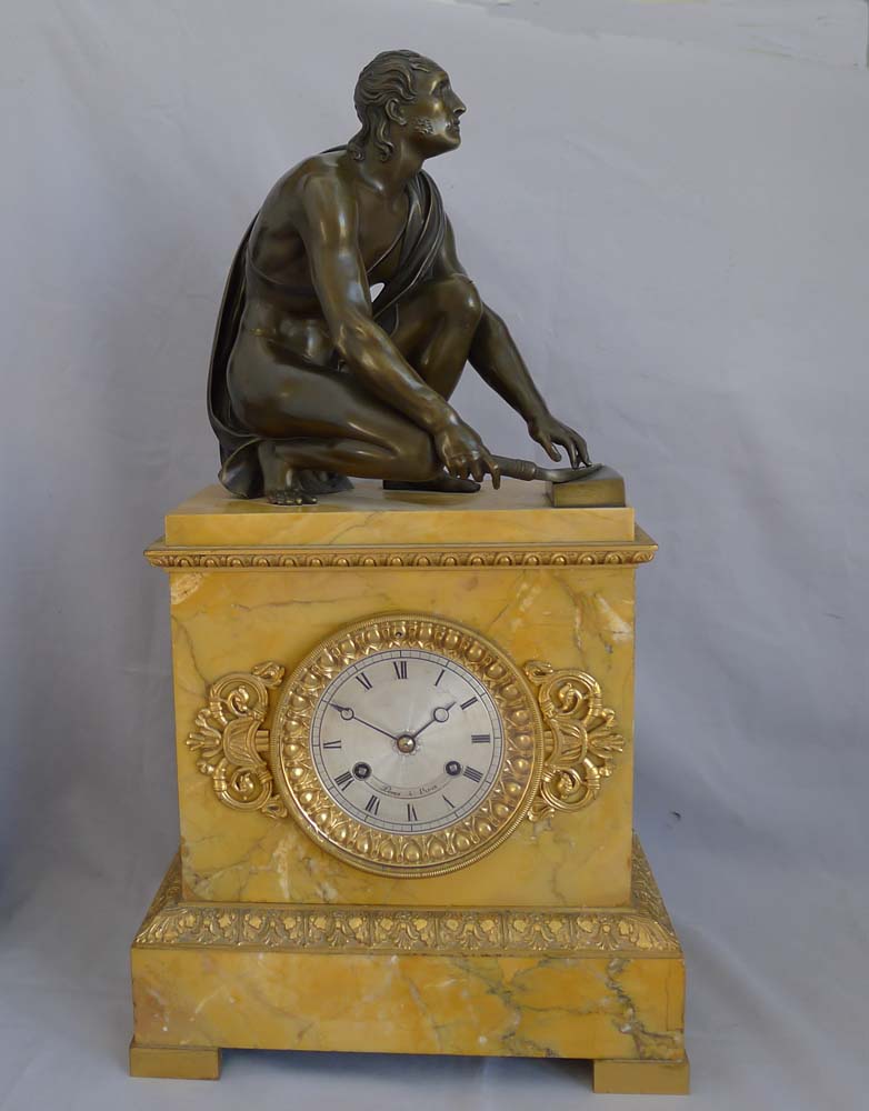 Antique French Sienna marble clock with patinated bronze Grand Tour sculpture of The Arrotino.