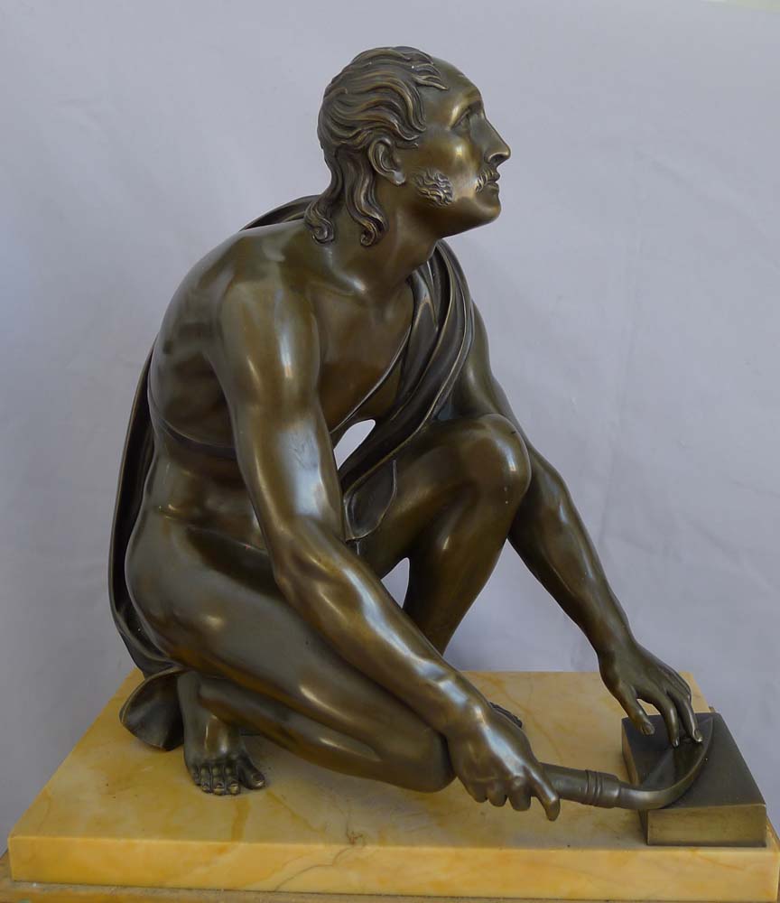 Antique French Sienna marble clock with patinated bronze Grand Tour sculpture of The Arrotino.
