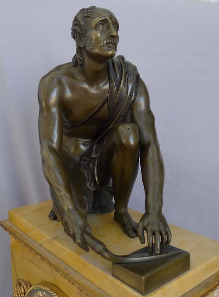 Antique French Sienna marble clock with patinated bronze Grand Tour sculpture of The Arrotino.