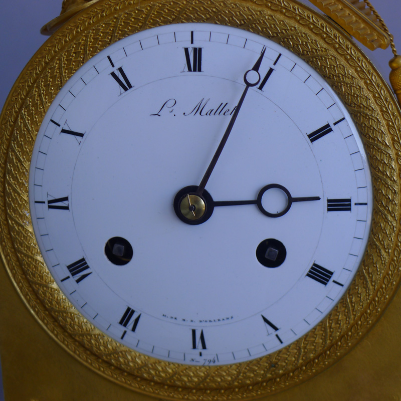 Antique French  Empire Ormolu mantel clock signed LS. Mallet