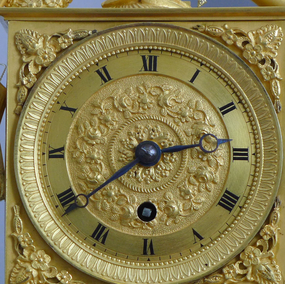 Antique French Restoration period Ormolu Mantel clock on musical base by Butte