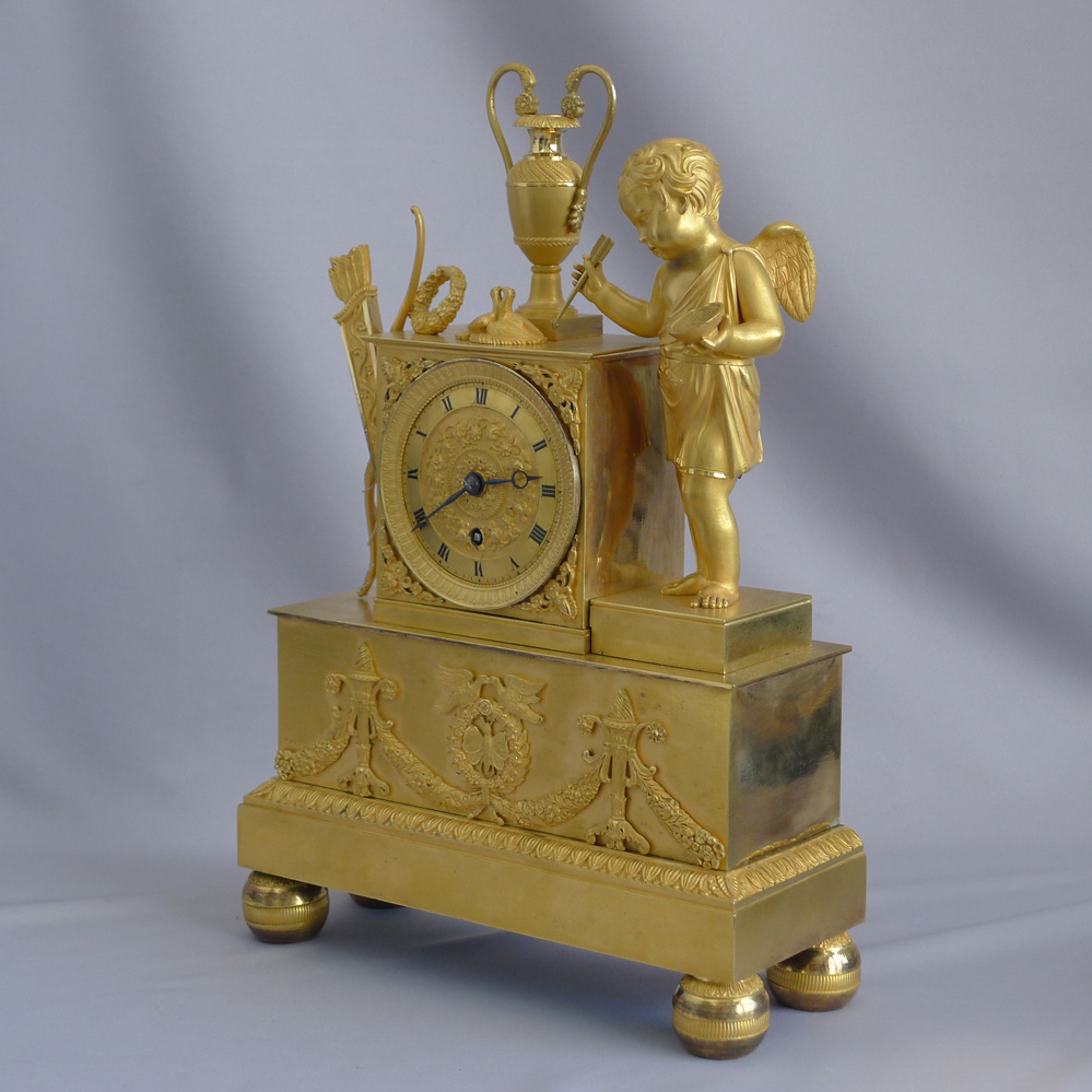 Antique French Restoration period Ormolu Mantel clock on musical base by Butte
