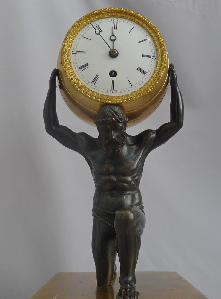 English Regency antique Ormolu and Patinated bronze mantel clock of Atlas holding the world