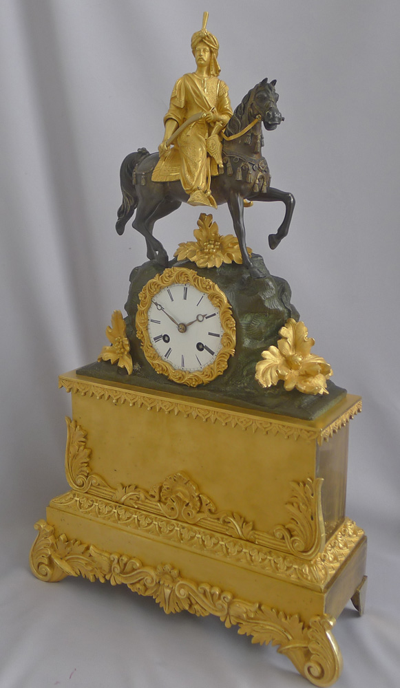 Antique French Greek Revolution or Hellenistic mantel clock of Turk on horseback