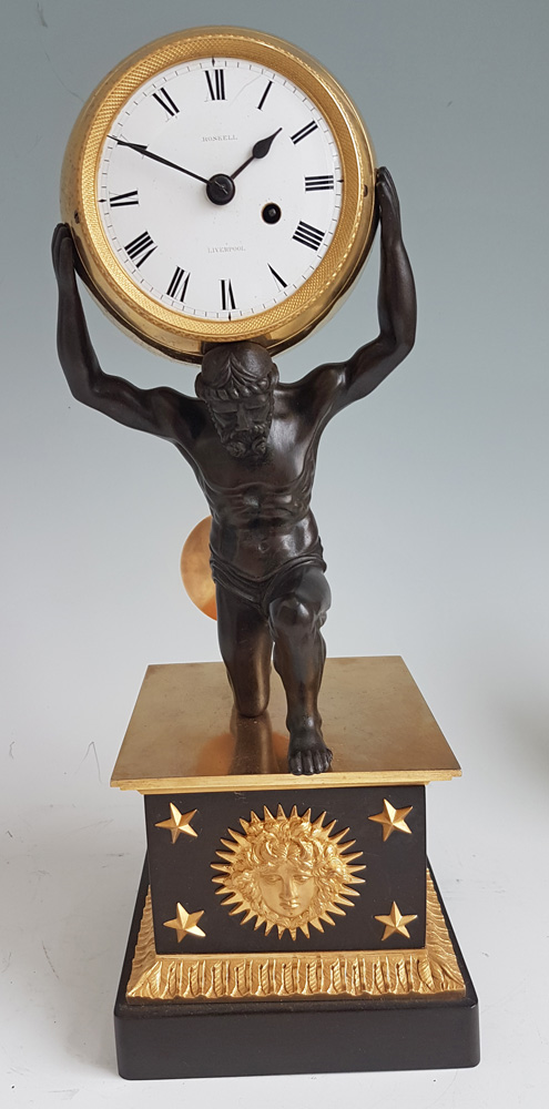 English Regency Ormolu and Patinated bronze mantel clock of Atlas holding the world by Roskell