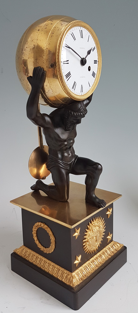 English Regency Ormolu and Patinated bronze mantel clock of Atlas holding the world by Roskell