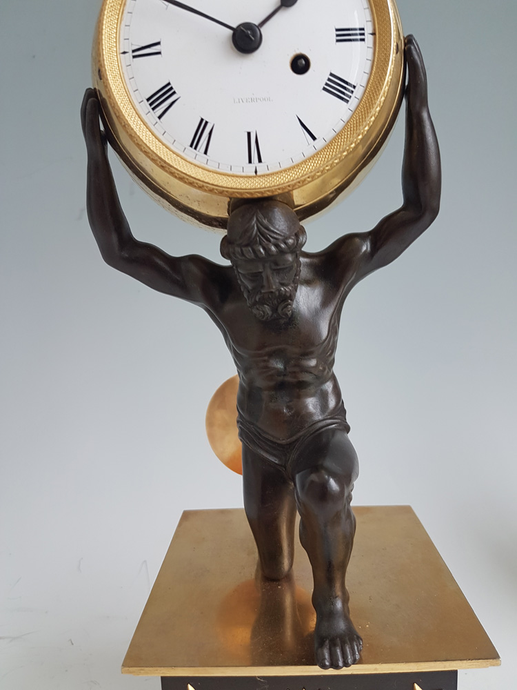 English Regency Ormolu and Patinated bronze mantel clock of Atlas holding the world by Roskell