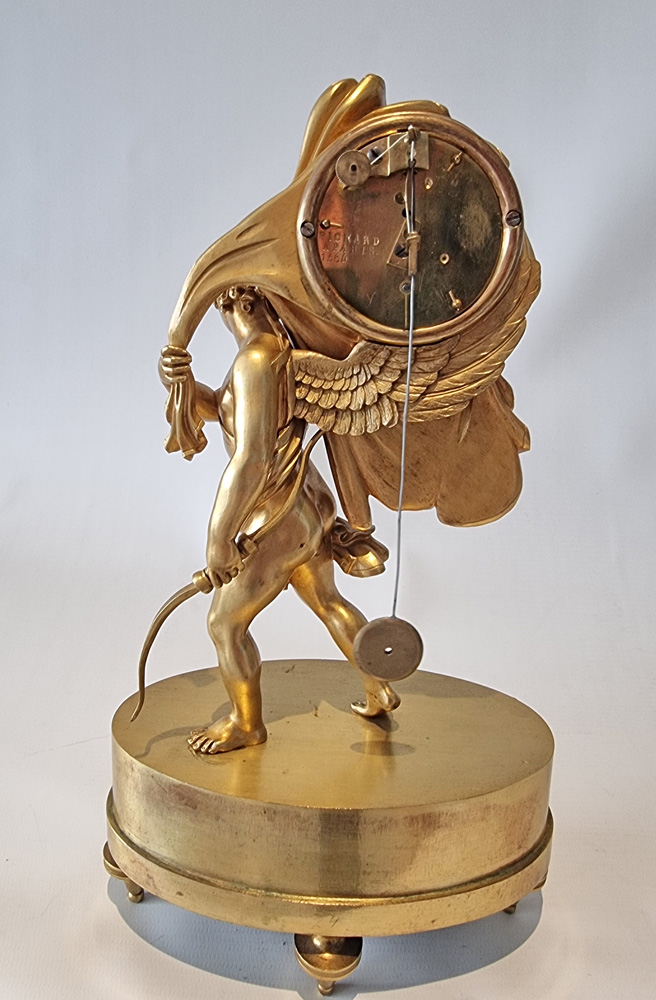 French Charles X miniature mantel clock of Cupid carrying time