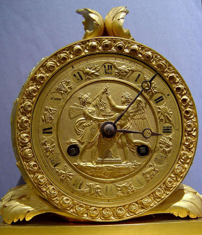Antique French ormolu mantel clock of psyche & cupid dated 1822.