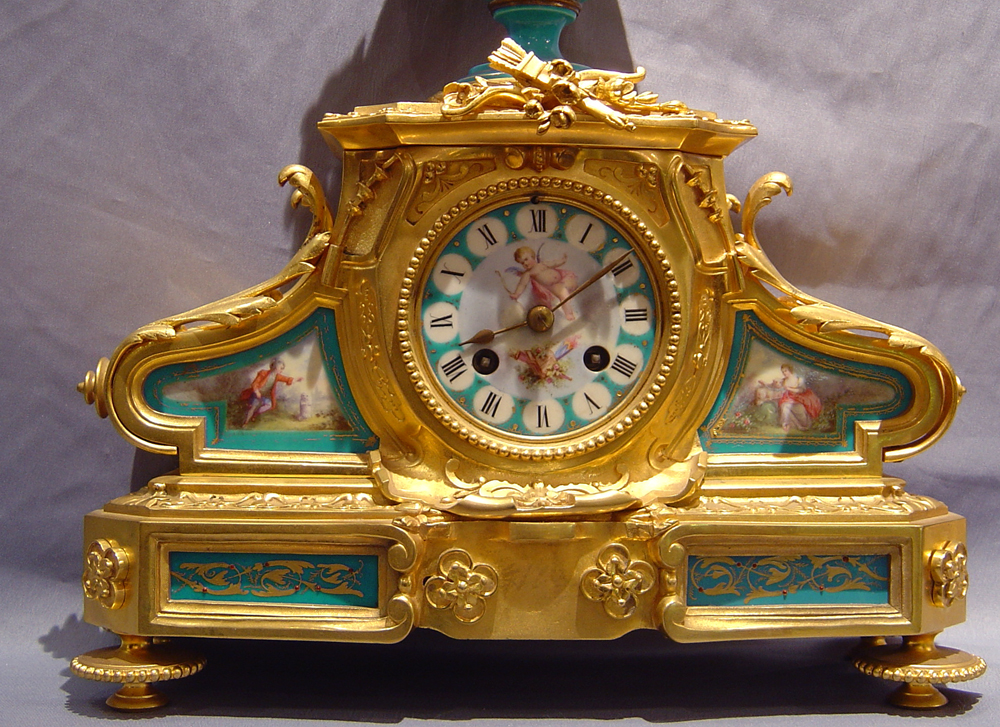 Antique French blue porcelain and ormolu clock.