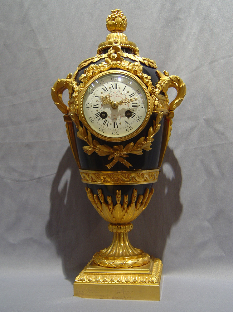 Antique French Napoleon III enamel and ormolu urn clock signed in the bronze Eug. Hazard.