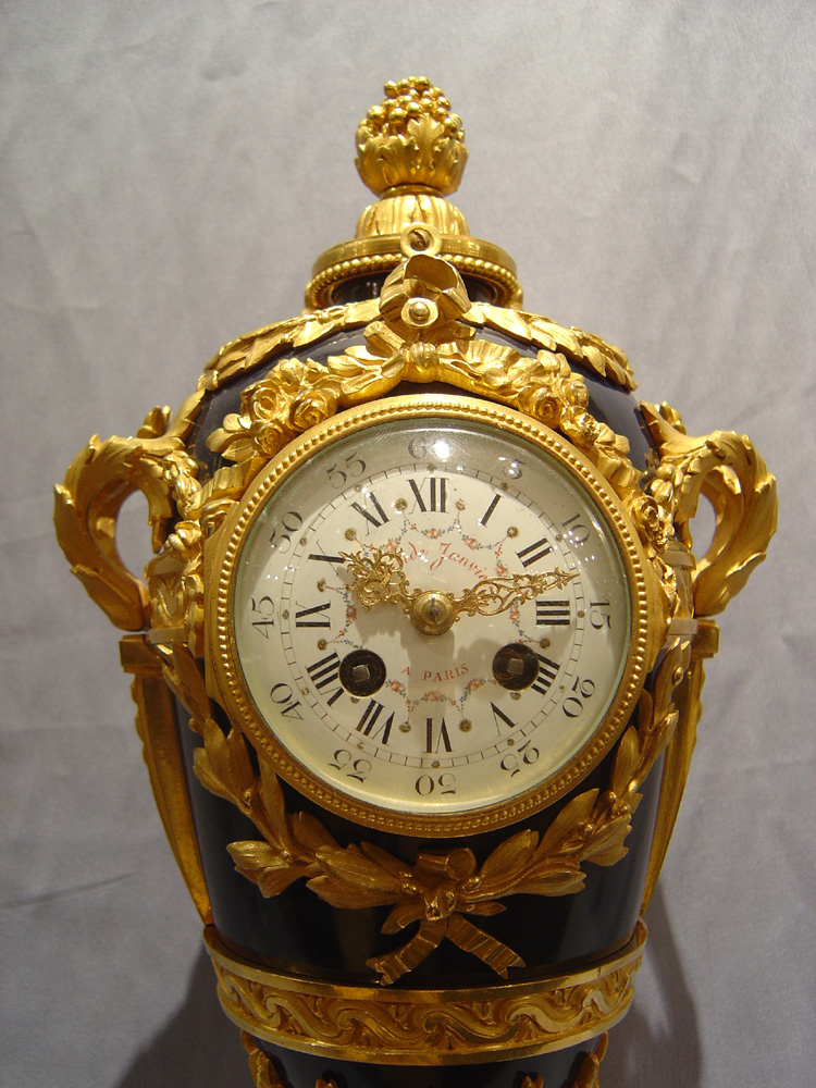 Antique French Napoleon III enamel and ormolu urn clock signed in the bronze Eug. Hazard.