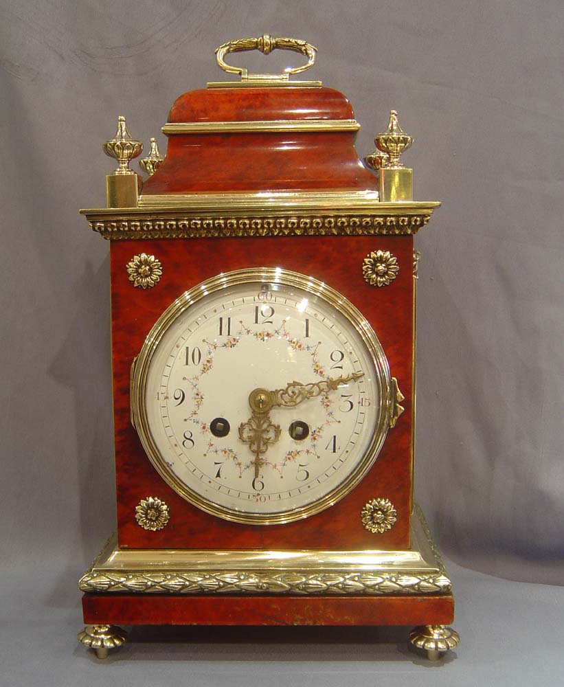 Antique French scarlet stained tortoiseshell and gilt bronze mantel clock